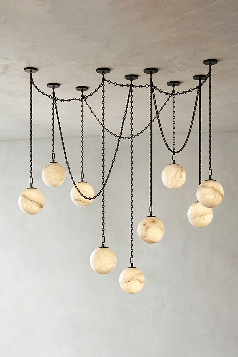 Thalia Alabaster Spherical Chain Chandelier with hand-carved alabaster spheres and brushed links.