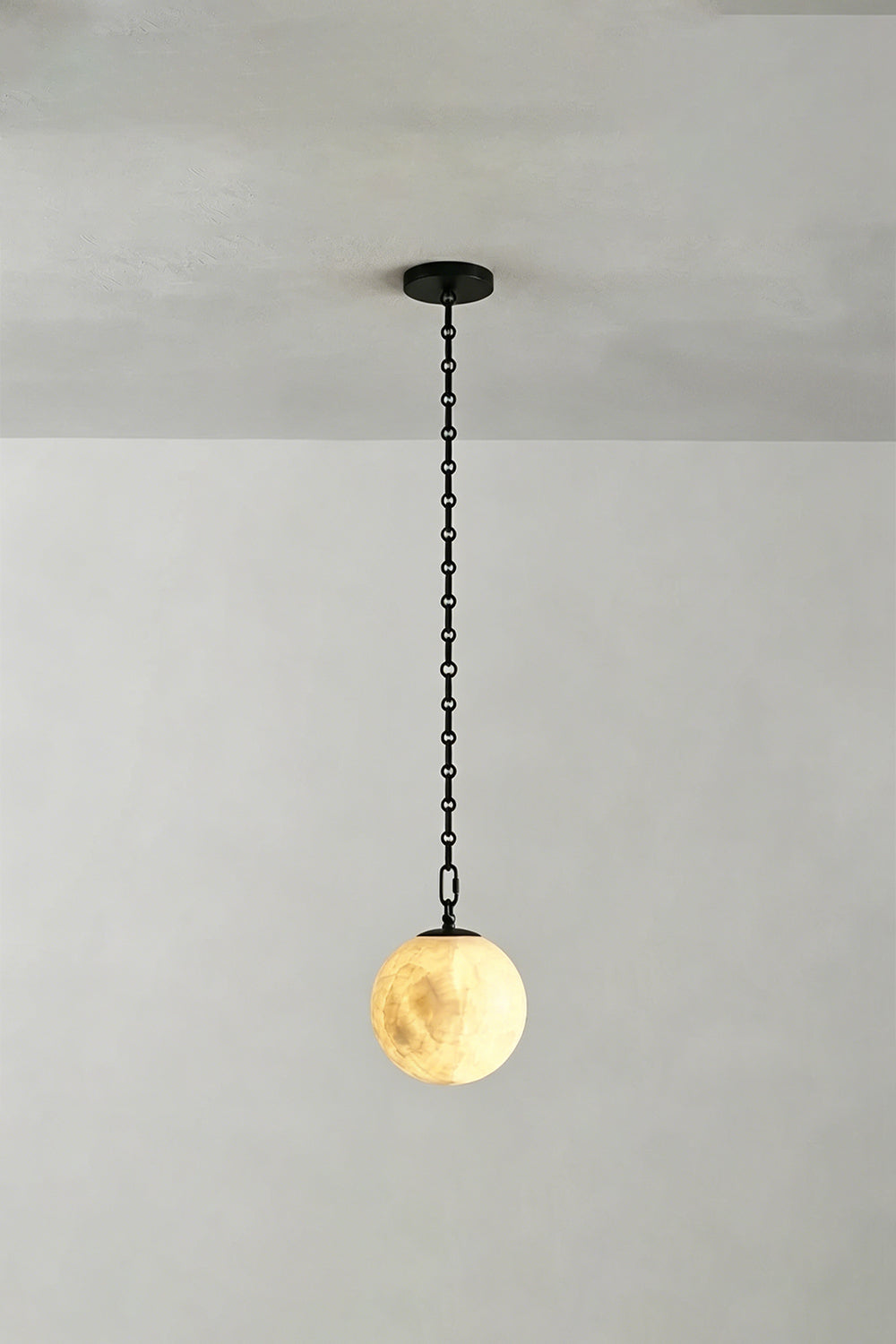 Thalia Alabaster Spherical Chain Chandelier with hand-carved alabaster spheres and brushed links.
