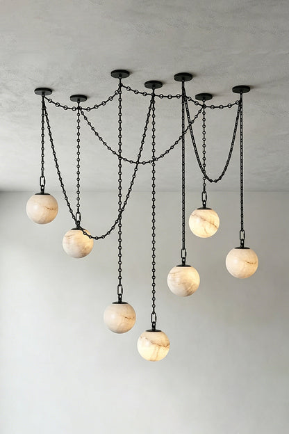 Thalia Alabaster Spherical Chain Chandelier with hand-carved alabaster spheres and brushed links.