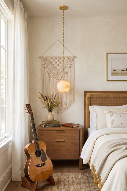 Thalia Alabaster Spherical Chain Chandelier in a cozy bedroom with a guitar and decorative elements.