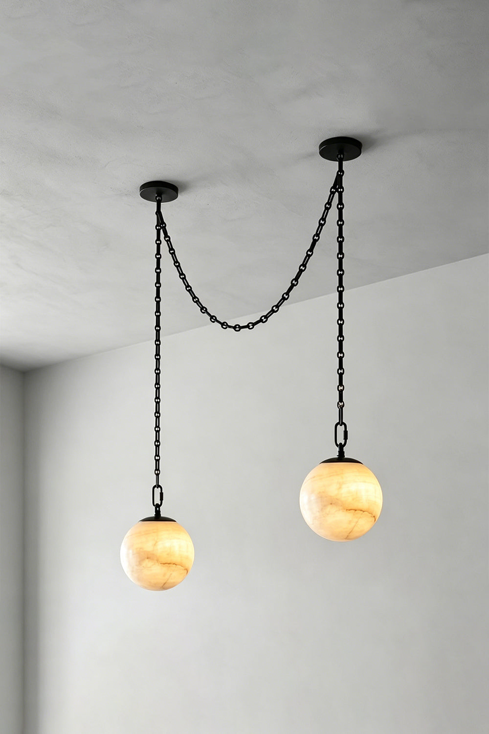Thalia Alabaster Spherical Chain Chandelier with hand-carved alabaster spheres and brushed links.