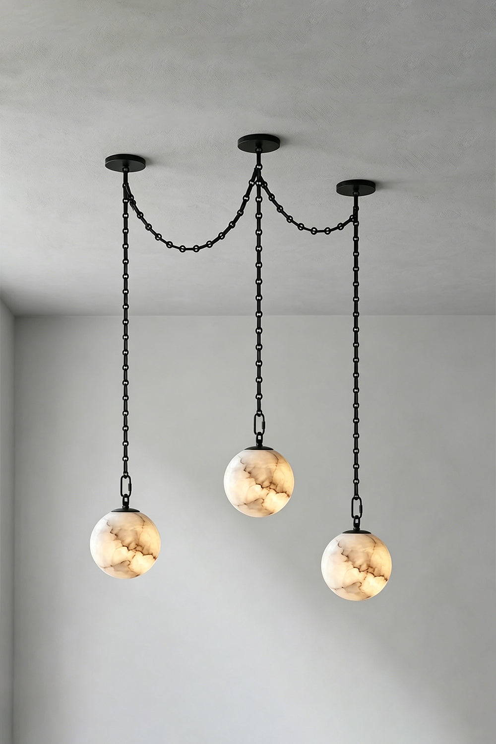 Thalia Alabaster Spherical Chain Chandelier with hand-carved alabaster spheres and brushed links.
