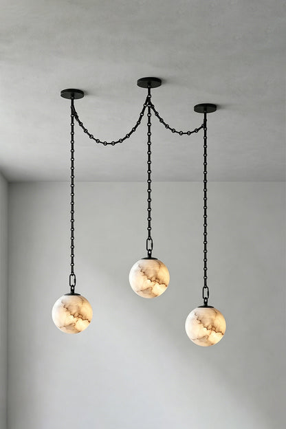 Thalia Alabaster Spherical Chain Chandelier with hand-carved alabaster spheres and brushed links.
