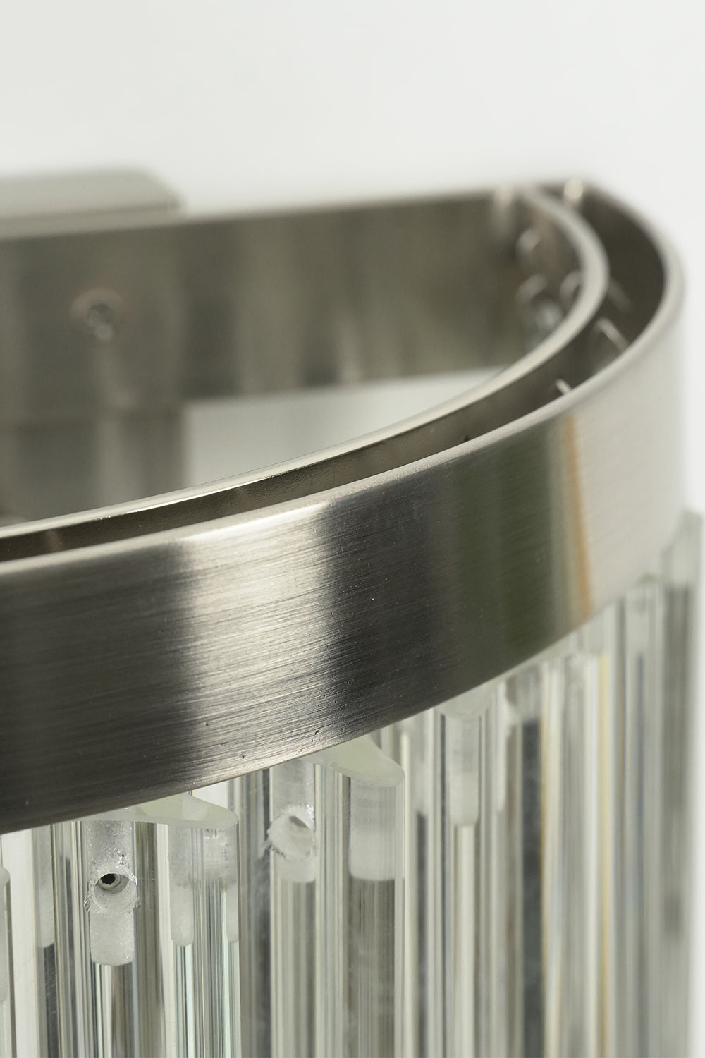 Angled close-up of unlit wall light top frame | Metal, Glass | Detail view of mounting and framework | everlamps