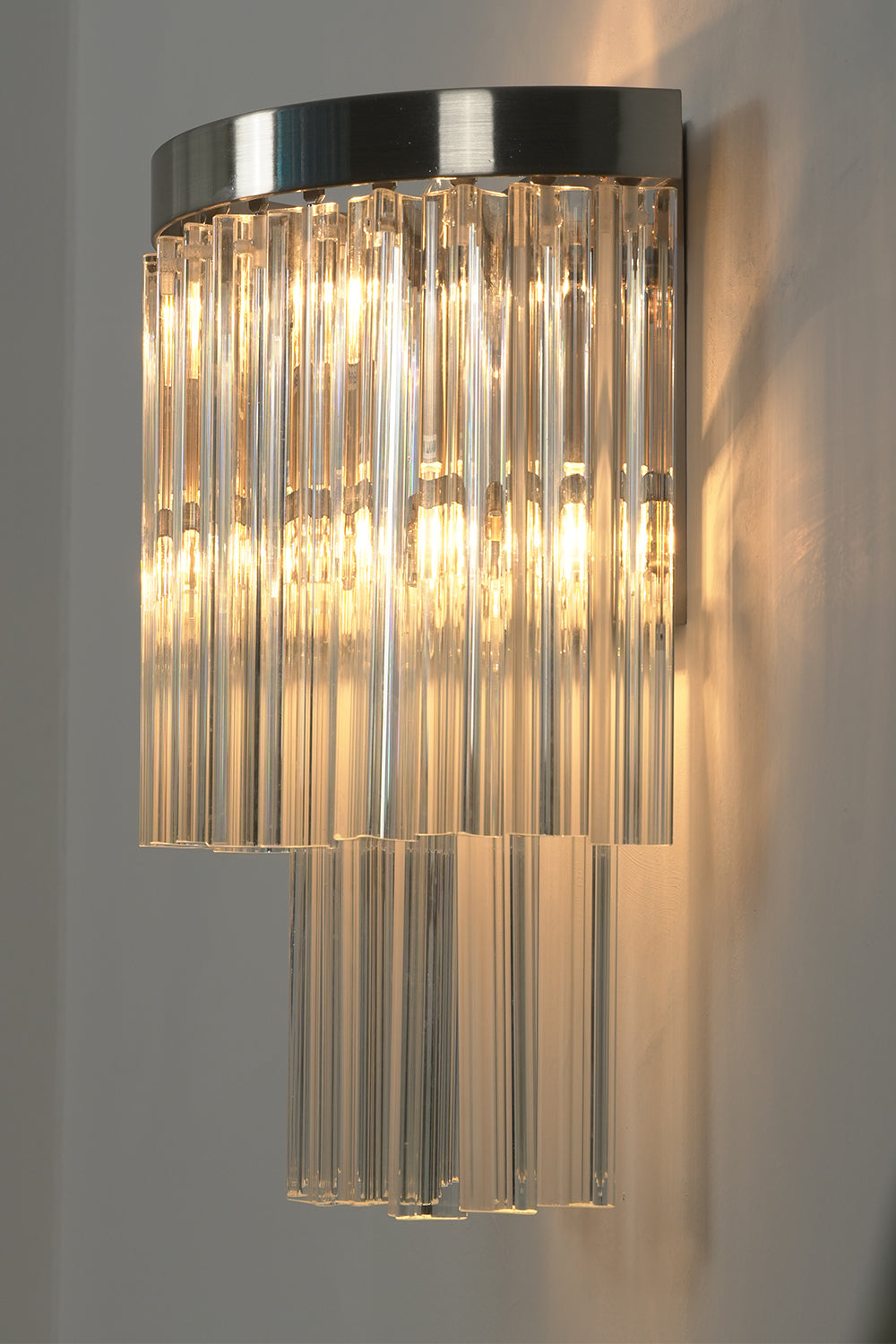 Angled close-up of lit glass rods | Metal, Glass | Detail view showing rod texture | everlamps
