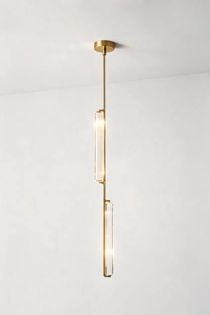 Torvald Crystal Bar Drop Pendant Light showcasing a modern design with sleek gold accents and elegant crystal detail.