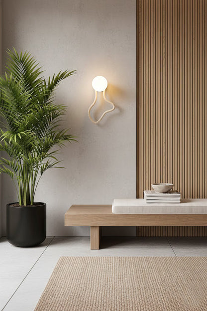 Flow wall light with travertine and glass elements | Travertine, Glass, Wood | Zen interior with a tall plant and wooden bench | vexa lamps