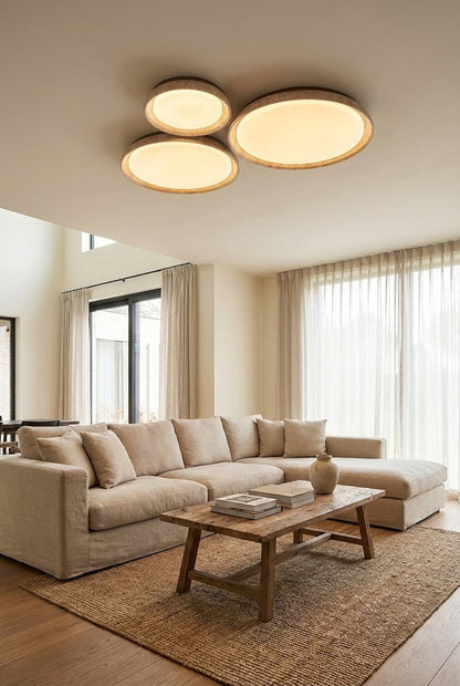 Cluster of three round travertine flush mount lights | Wood, Travertine, Acrylic | Decorative arrangement in a spacious modern lounge | vexa lamps