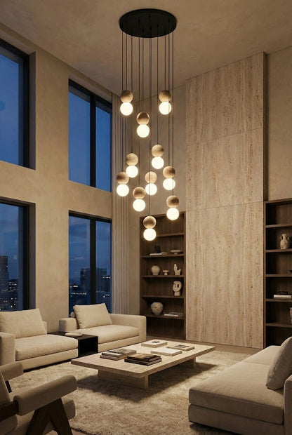 Multi-light cascading travertine stone chandelier | Yellow Travertine, Glass | Grand installation in a modern luxury living room | vexa lamps