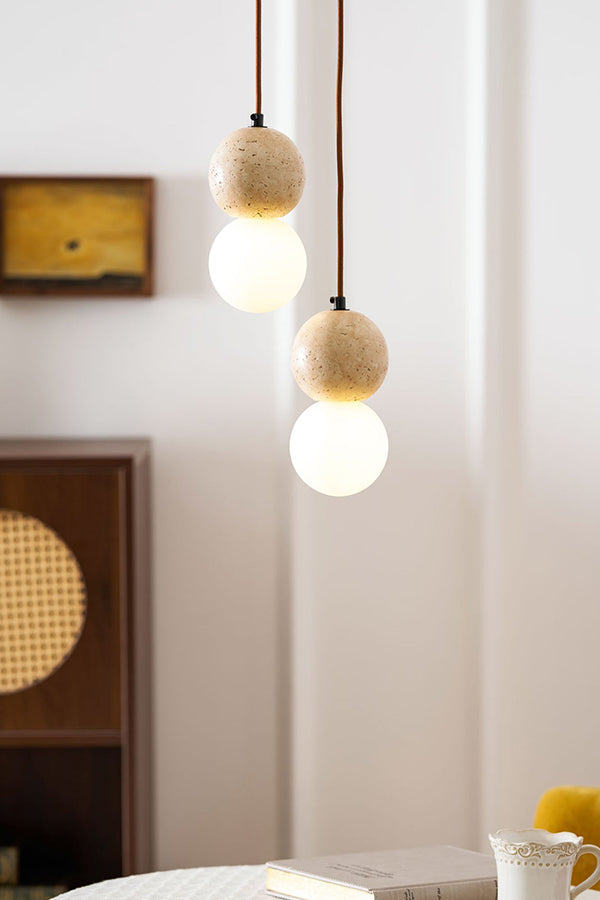 2-light cluster travertine pendant detail | Yellow Travertine, Glass | Close-up showing the stone texture and glass globes | vexa lamps