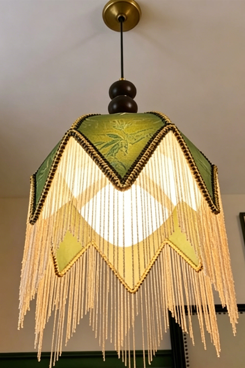 Verdure Cascade Pendant Light detail | Wood, Metal, Fabric | Angle perspective looking up at cascading fringes | Product detail | vexa lamps
