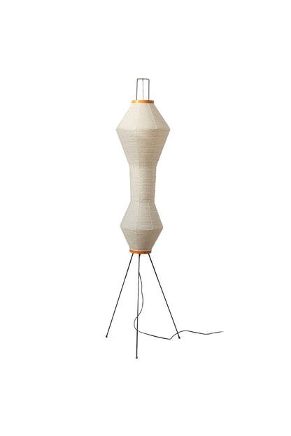 Verena Hourglass Paper Floor Lamp with a sculptural hourglass shape and slim black metal base.