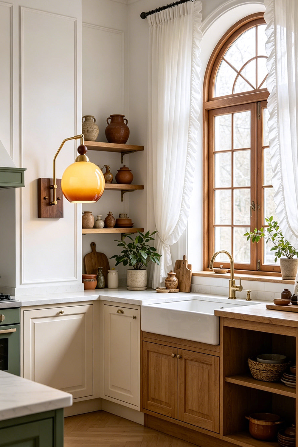 Vesper Caramel Gradient Wall Lamp | Glass, Metal, Wood | Wall-mounted near a bright arched window over a cozy rustic farmhouse kitchen counter with white cabinetry | vexa lamps