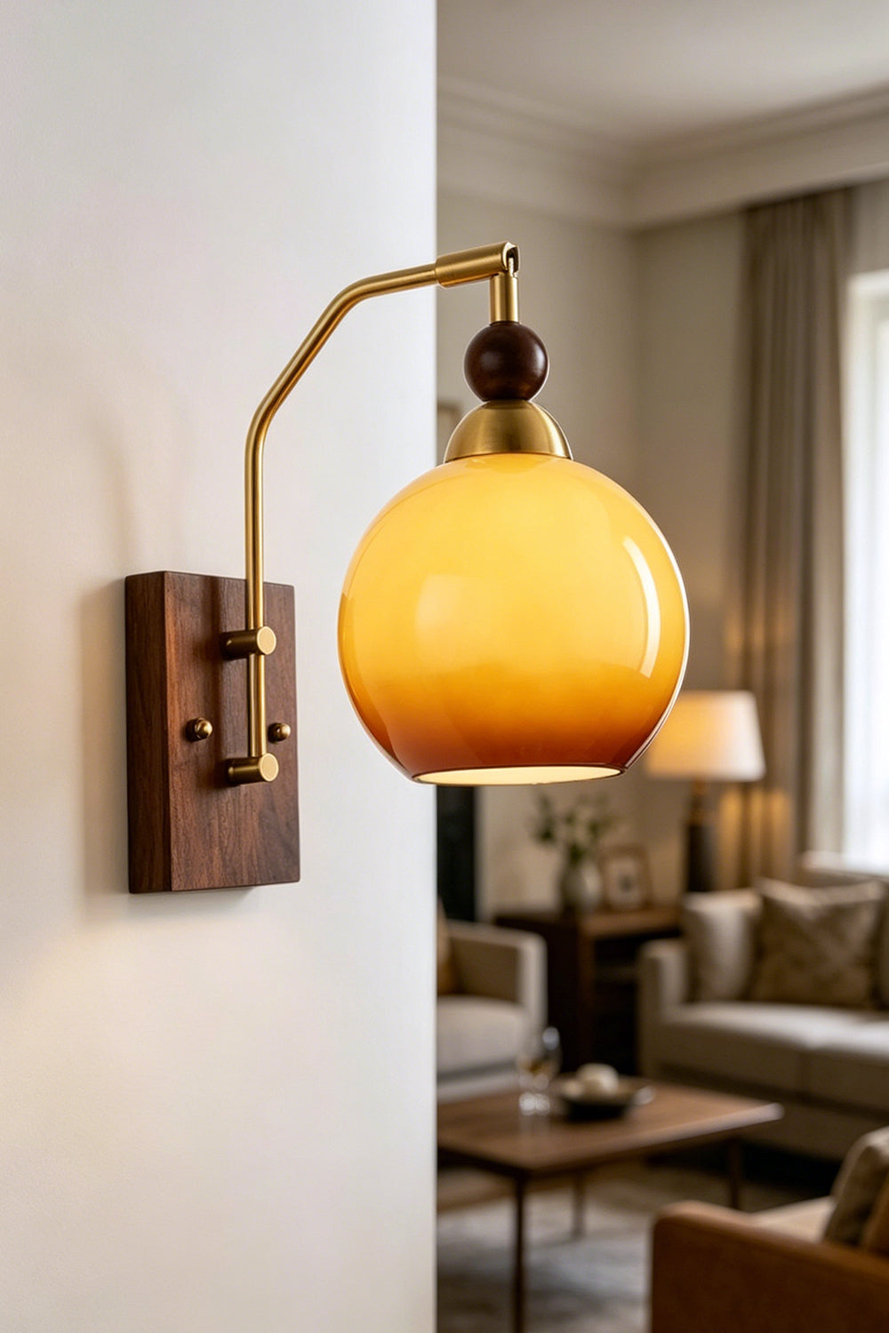 Vesper Caramel Gradient Wall Lamp | Glass, Metal, Wood | Mounted on a neutral corner column wall, casting a soft golden glow overlooking a modern classic lounge space | vexa lamps