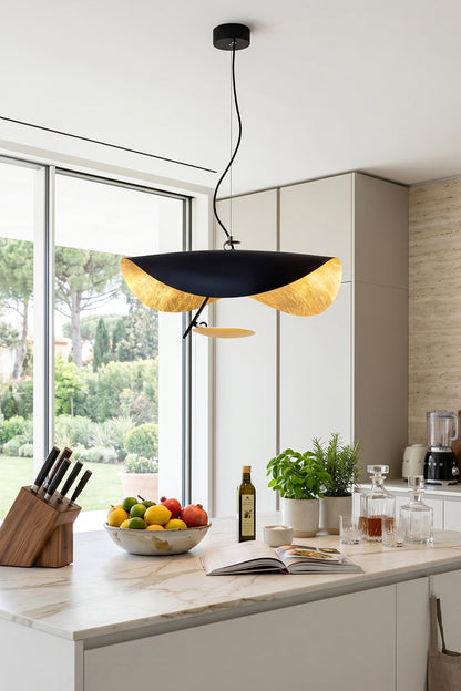 Voluta Horizon Metal Pendant Light | Metal | Black wave pendant light hanging as central lighting over a modern white kitchen island | vexa lamps