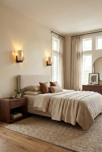 Pair of Wabi-Sabi travertine wall lamps flanking a bed | Travertine, Wood | Full bedroom interior with neutral tones and wooden furniture | vexa lamps