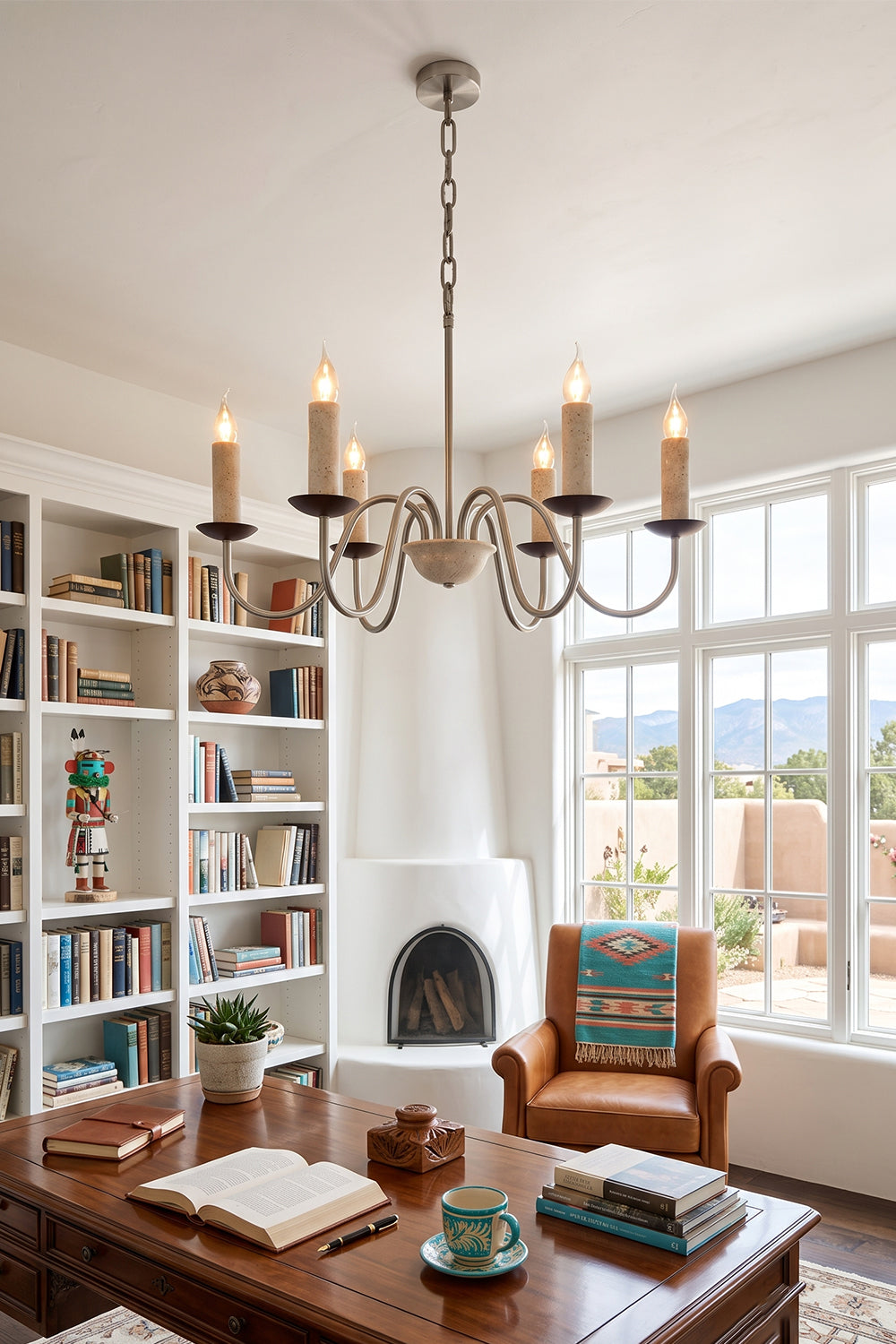 Winslow Travertine Candelabra Chandelier | Natural Travertine and Metal | Illuminating a rustic living room with a white fireplace | vexa lamps