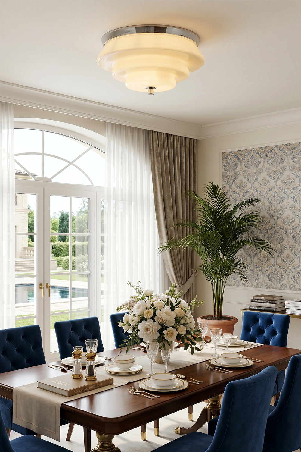 Ziggurat Horizon Glass Ceiling Light illuminating a stylish dining room with a stunning three-tiered glass shade.