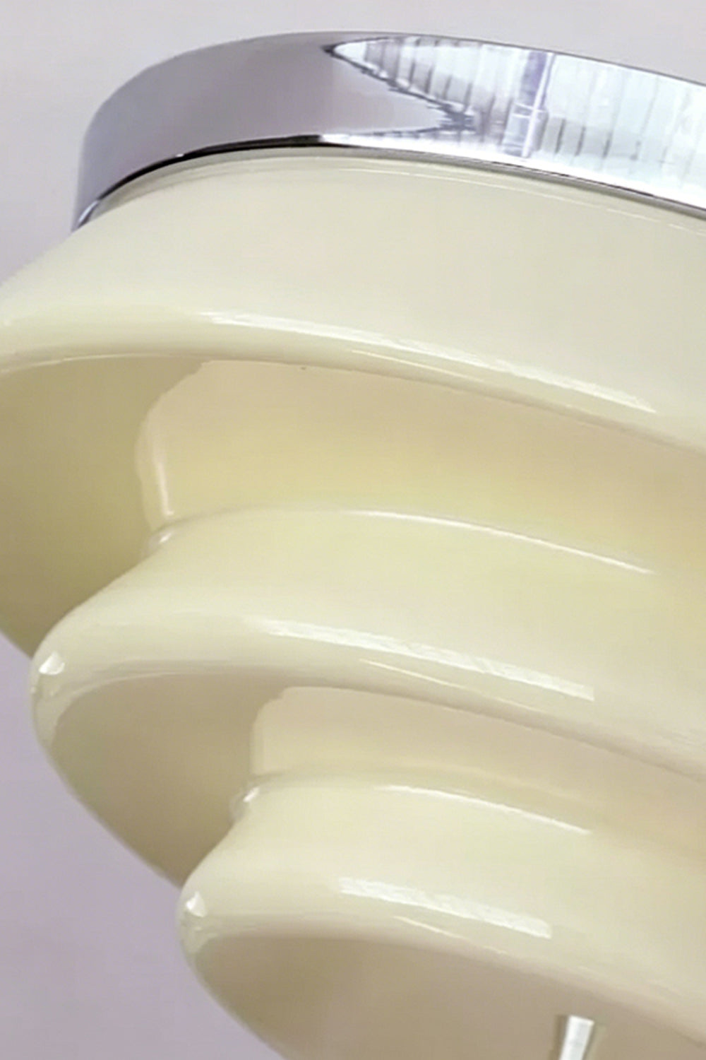 Ziggurat Horizon Glass Ceiling Light showcasing its elegant three-tiered glass shade and polished chrome collar.