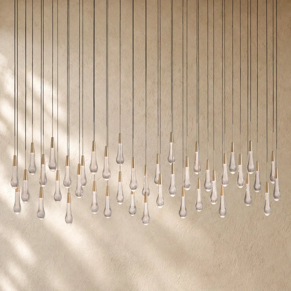 Soltairan Linear Chandelier - Raindrop Pendant Lighting - 70” 42-Light / Brass